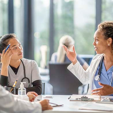 A%20group%20of%20medical%20professionals%20in%20a%20meeting