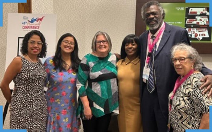 a group picture of an attendees of the National Association of Hispanic Nurses 48 Annual Conference including Ernest Grant and Jennifer Gil