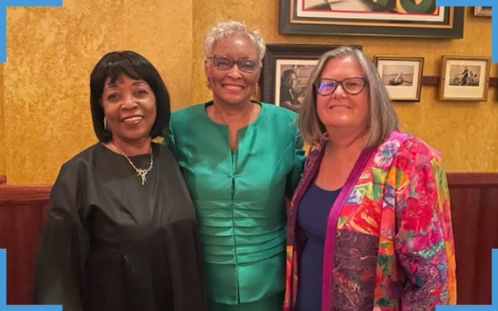 a group picture of Cheryl Peterson with Doctor Rumay Alexander and Doctor Sarah Killian