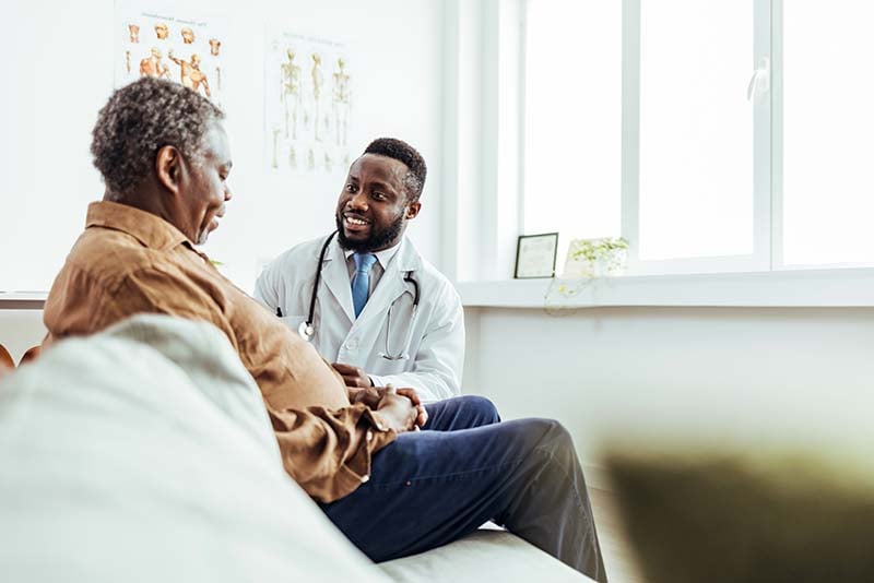 A doctor talking to a patient