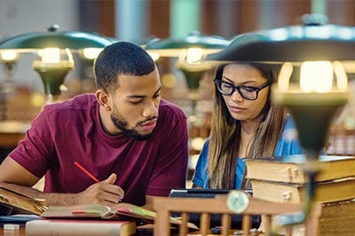 Students Studying in a Library